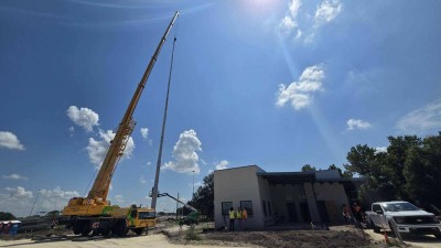 Image of flagpole installation work at future I-4 truck parking facility in Hillsborough County (Photo July 2026)