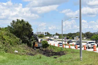 Clearing for the widening has begun along the southbound I-275 exit ramp to 54th Avenue N (8-12-2025 photo)