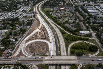 Looking north over the I-275 / 54th Avenue N interchange at ramp reconstruction in the northwest corner  (7-15-2026 photo)