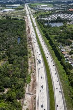 Looking north over I-275 toward the Gandy Blvd. interchange at widening work on the west side of the corridor (6-15-2026 photo)