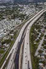 Looking northwest over I-275 at temporary pavement for future traffic shift in the median north of 38th Avenue N (1-14-2026 photo)
