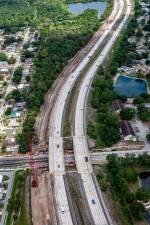 Looking north over I-275 at bridge widening work on the west side of I-275 over 62nd Avenue N (5-14-2026 photo)