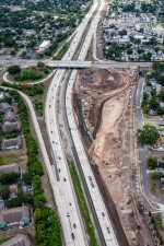 Looking southeast over I-275 at reconstruction of the 54th Avenue N interchange ramps in the northwest quadrant (5-14-2026 photo)