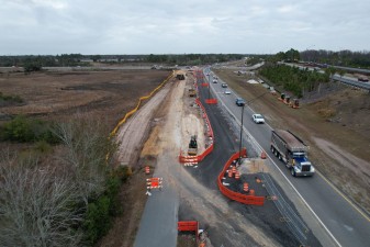 Looking north at the temporary trail realignment next to the southbound SR 589 entrance ramp (2-18-2026 photo)