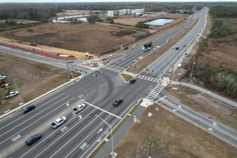 Looking southwest at the beginning of work for the bridge approach on the south side of SR 52 (2-18-2026 photo)