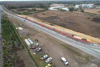 Looking southwest at the beginning of work for the bridge approach on the south side of SR 52 (2-18-2026 photo)