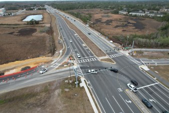 Looking west over SR 52 at the beginning of work for the bridge approach on the south side of SR 52 (2-18-2026 photo)