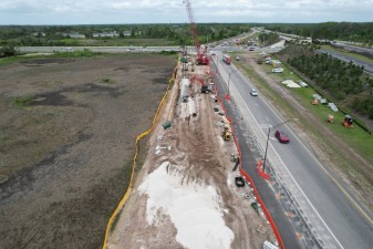 Looking north at construction of the bridge approach next to the entrance ramp onto southbound SR 589 (4-9-2026 photo)