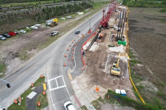 Looking southeast at construction of the bridge approach next to the entrance ramp onto southbound SR 589 (4-9-2026 photo)