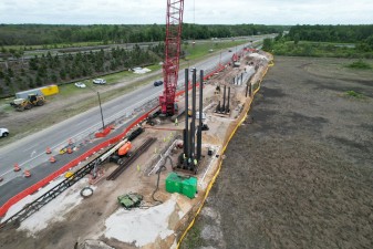 Looking southeast at construction of the bridge approach next to the entrance ramp onto southbound SR 589 (4-9-2026 photo)