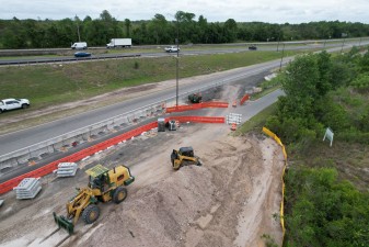 Looking southeast at construction of the bridge approach next to the entrance ramp onto southbound SR 589 (4-9-2026 photo)