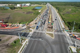 Looking west over SR 52 at bridge pier construction in the median (6-10-2026 photo)