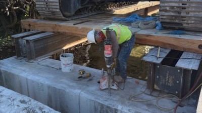 Crews perform concrete coring and substructure demolition (April 2026 photo