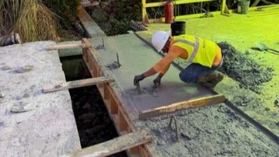 Crews pour concrete for 62nd Ave S Bridge (May 2026 photo)