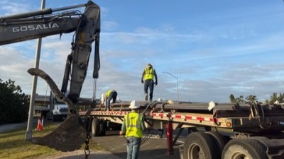 Crews unload rebar (April 2026 photo)