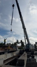 Material unloading at trestle span (September 2026 photo)