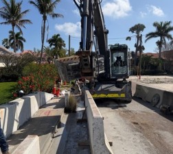 Sawcut and removal of existing barrier wall (March 2026 photo)