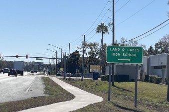 Looking south along US 41 at new sidewalk next to Land O' Lakes High School (1-28-2026 photo)