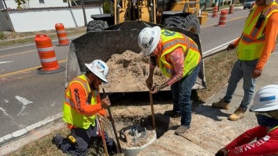 Crew prepare to install pedestrian mid-block crossing signal at San Salvador Drive (April 2026 photo)