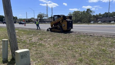 Crews grade the shoulder along northbound US 19 (April 2026 Photo)
