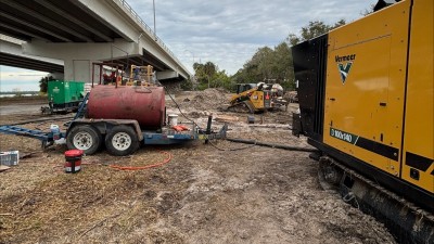 Generator and fuel tanks power the dewatering pumps (February 2026 photo)