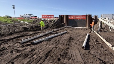Crews prepare to install pipes to drainage structures (July 2026 photo)