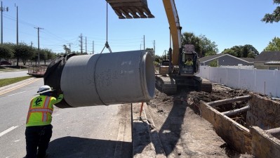 Looking east on Curlew Road as crews place drainage structure (May 2026 photo)
