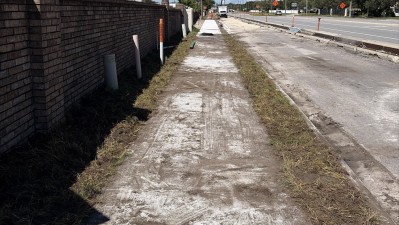 Looking west at SR 586 (Curlew Road) at new sidewalk installed (September 2026 photo)