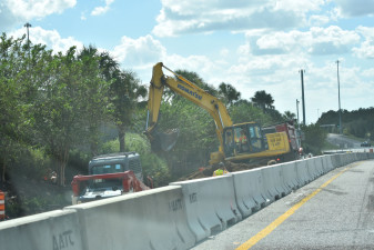 Work behind barrier wall on the southbound I-75 exit ramp to CR 54 (10-21-2026 photo)