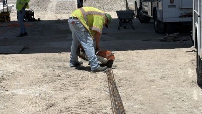Crews cutting rebar for SR 682 (Pinellas Bayway) Toll Plaza Removal (July 2026 photo)