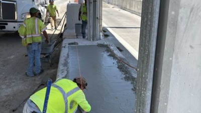 Looking east at concrete finishing for SR 682 (Pinellas Bayway) Toll Plaza Removal (July 2026 photo)