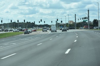 Looking west on SR 56 at Grand Cypress Blvd. with traffic lanes in the final alignment (10/11/2022 photo)