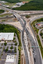 Looking northwest over SR 56 at I-75 in the new diverging diamond interchange traffic pattern (5/17/2022 photo)
