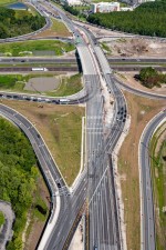 Looking west over SR 56 --  the crossovers on each side of I-75 are part of the  Diverging Diamond Interchange traffic pattern put into place on May 1, 2022  (6/17/2022 photo)